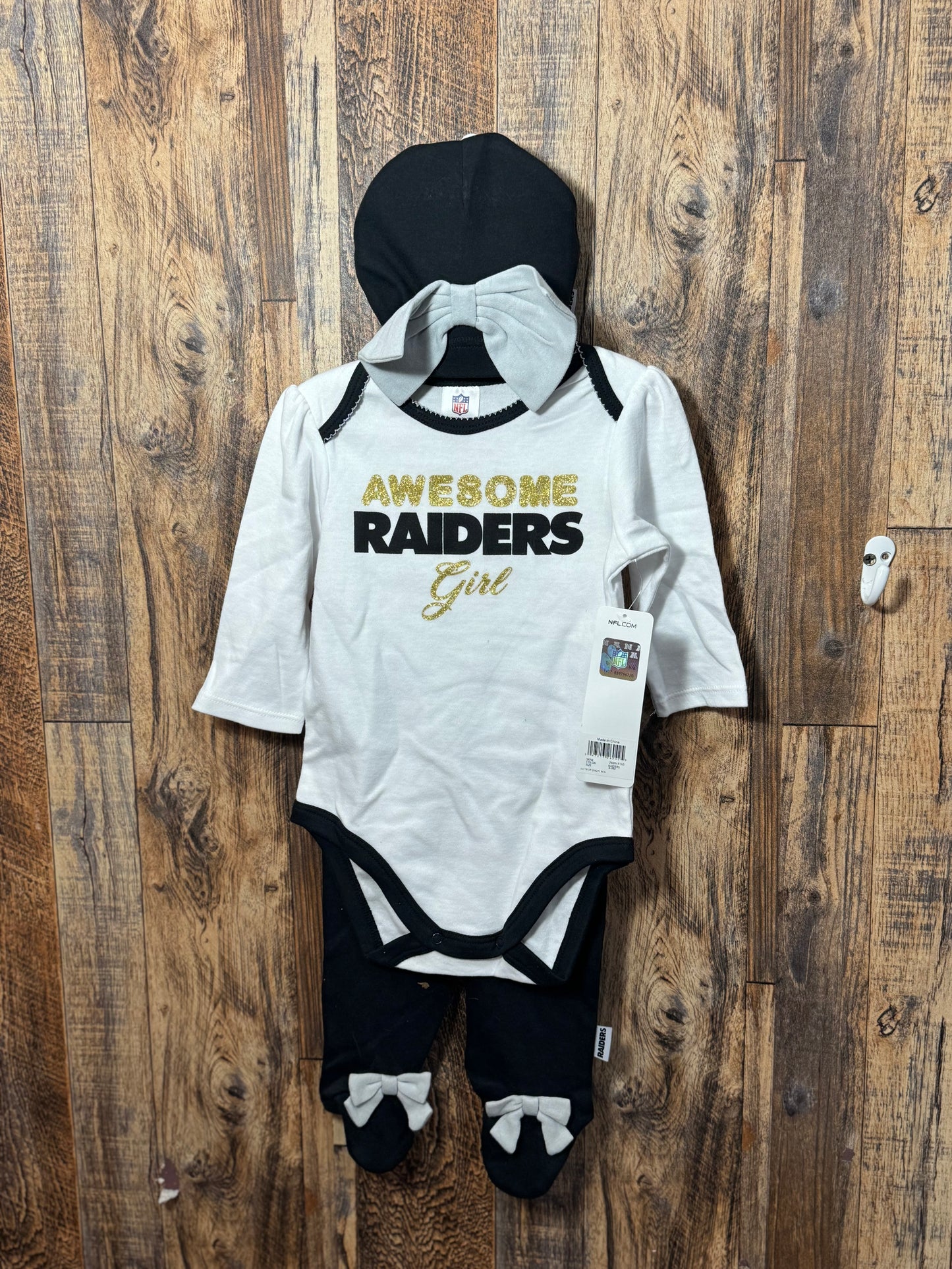 Raiders 3pc set NWT, size 6-9m
