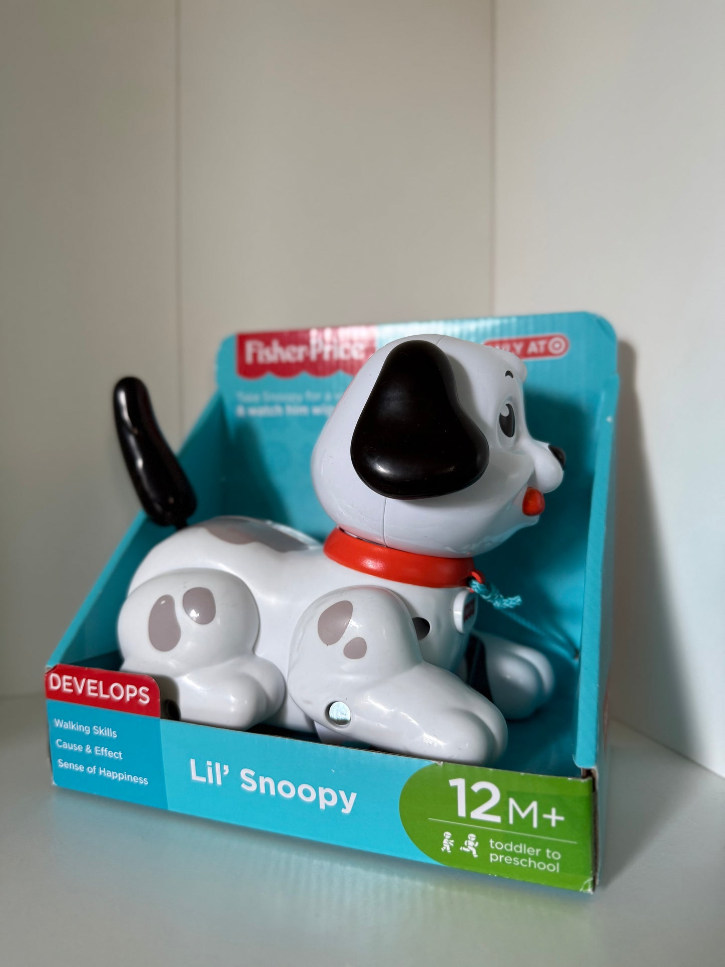 Pull behind puppy toy