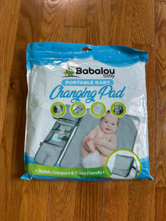 Portable changing pad