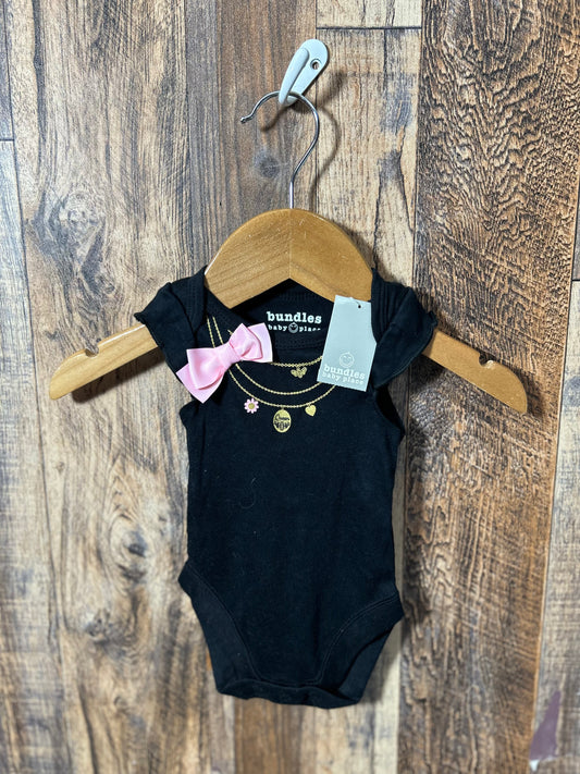 Onesie NWT, size up to 7lbs