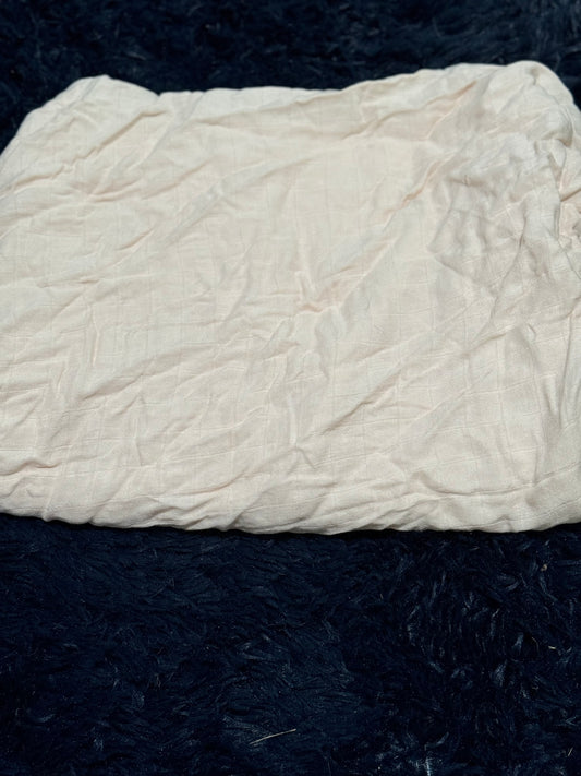 Light Peach colored lightweight blanket